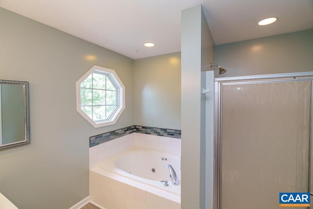 895 Jefferson Dr, Palmyra, VA 22963 - bathroom featuring a shower stall, a tub with jets, recessed lighting, and baseboards