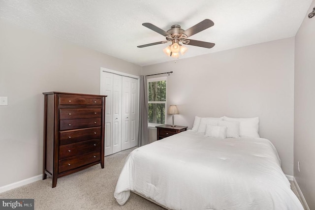 6217 Oak Grove Dr, Fredericksburg, VA 22407 - bedroom featuring a closet, light carpet, and a ceiling fan