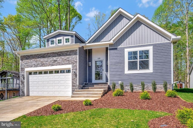 112 Edgehill Dr, Locust Grove, VA 22508 - craftsman house with concrete driveway, board and batten siding, and stone siding