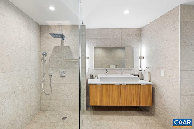 218 Water St W Unit 705, Charlottesville, VA 22902 - bathroom featuring vanity, recessed lighting, and a tile shower