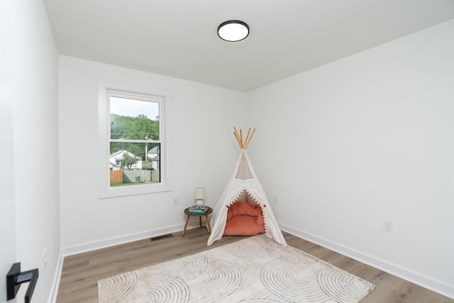 1401 B St, Waynesboro, VA 22980 - rec room with wood finished floors and baseboards