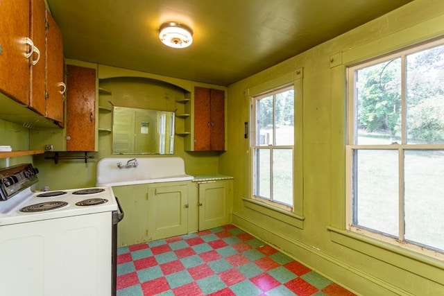 253 Church St, Timberville, VA 22853 - kitchen featuring light floors, open shelves, a healthy amount of sunlight, and white range with electric cooktop