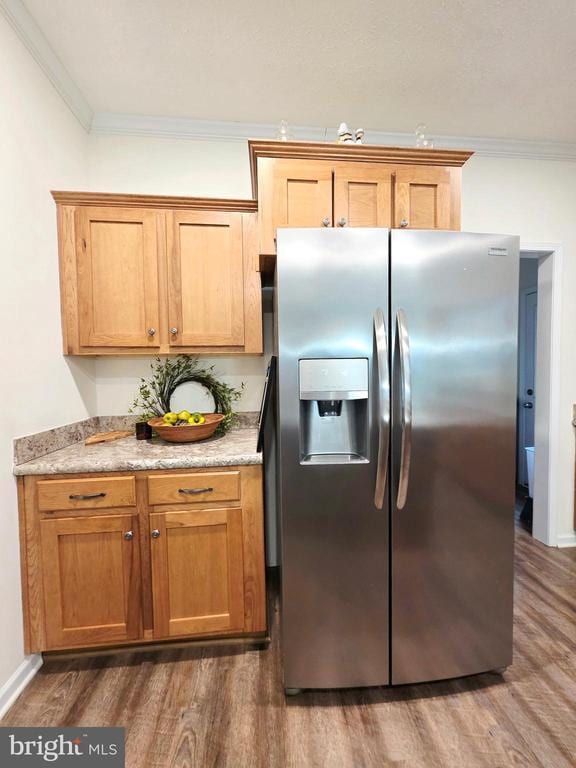 14511 Antler Rd, Fredericksburg, VA 22407 - kitchen with stainless steel fridge with ice dispenser, ornamental molding, dark wood finished floors, and baseboards