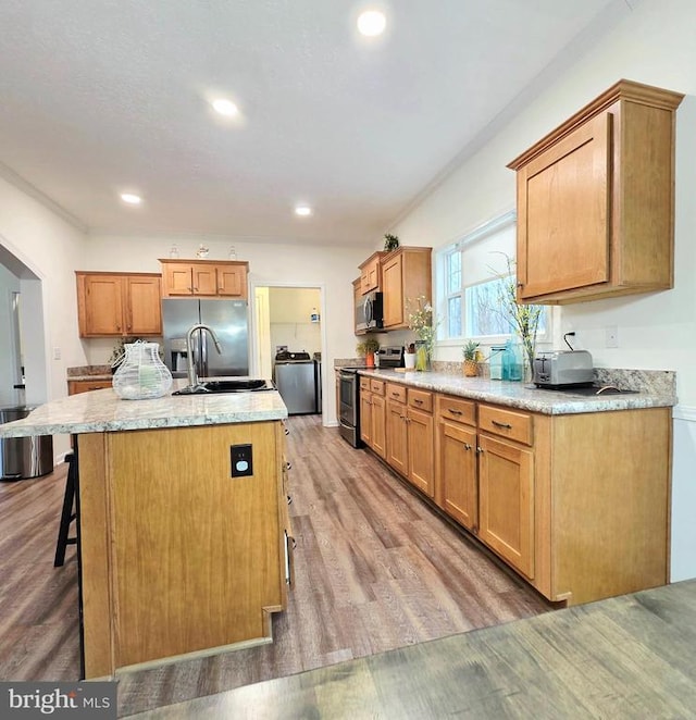 14511 Antler Rd, Fredericksburg, VA 22407 - kitchen with appliances with stainless steel finishes, light wood-style floors, a sink, and recessed lighting