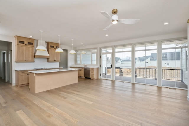 135 Radnor Ct, Rockingham, VA 22801 - kitchen featuring recessed lighting, dishwasher, custom range hood, a kitchen island, and light countertops