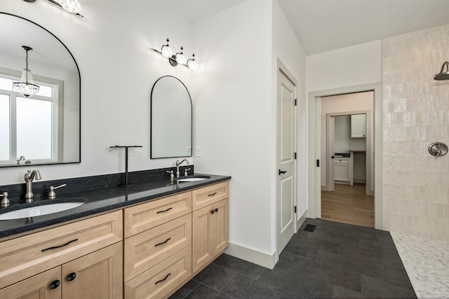 135 Radnor Ct, Rockingham, VA 22801 - full bath with a sink, an inviting chandelier, and a tile shower