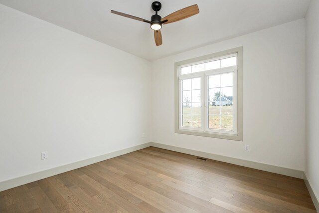 135 Radnor Ct, Rockingham, VA 22801 - spare room featuring baseboards, a ceiling fan, visible vents, and wood finished floors