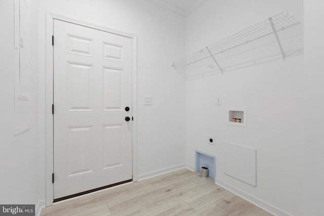 laundry room featuring baseboards, washer hookup, laundry area, light wood-style flooring, and electric dryer hookup