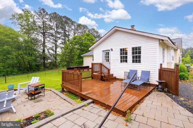 7615 Morris Rd, Spotsylvania, VA 22551 - back of property with a patio, a wooden deck, and a chimney