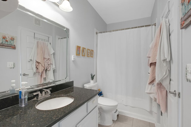 full bathroom with tile patterned floors, visible vents, toilet, shower / bath combination with curtain, and vanity