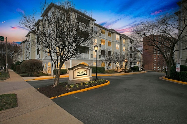 view of property at dusk