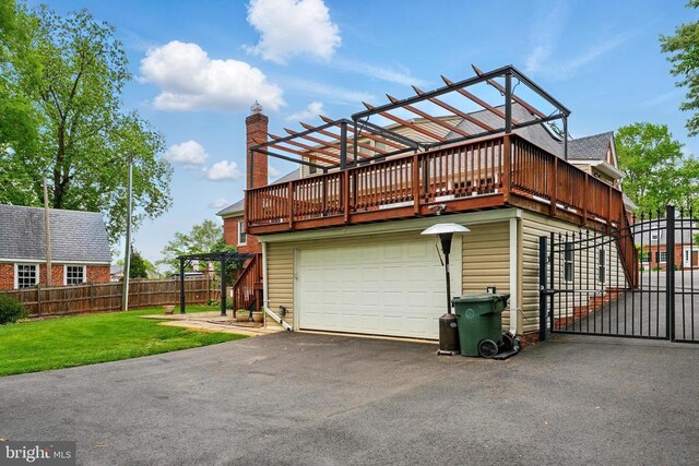view of property exterior featuring driveway, a deck, a garage, and a chimney