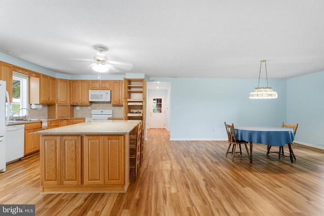 531 Parkview Estates Rd, Luray, VA 22835 - kitchen with white appliances, light wood finished floors, a kitchen island, decorative backsplash, and open shelves