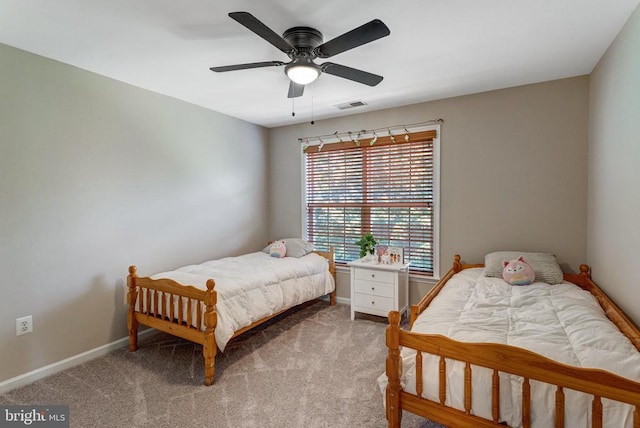 11211 Spring Meadow Blvd, Fredericksburg, VA 22407 - bedroom with light colored carpet and a ceiling fan