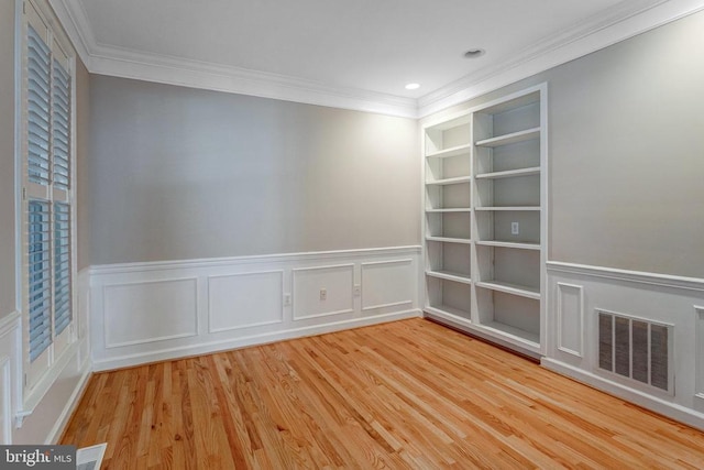 11211 Spring Meadow Blvd, Fredericksburg, VA 22407 - unfurnished room featuring ornamental molding, wood finished floors, a wainscoted wall, recessed lighting, and a decorative wall