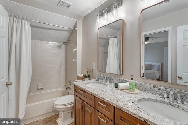 11211 Spring Meadow Blvd, Fredericksburg, VA 22407 - full bathroom featuring double vanity, shower / bath combo with shower curtain, ceiling fan, and connected bathroom