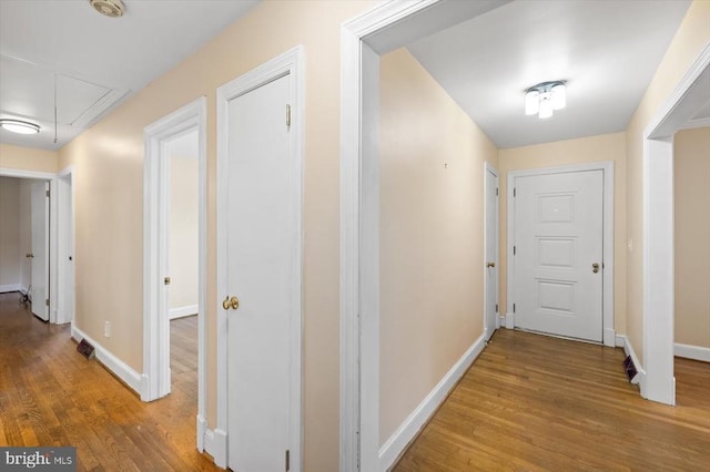 148 Red Hill Rd, Orange, VA 22960 - hallway with attic access, wood finished floors, and baseboards