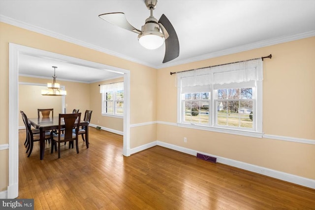 148 Red Hill Rd, Orange, VA 22960 - dining space with hardwood / wood-style flooring, baseboards, a chandelier, a ceiling fan, and ornamental molding