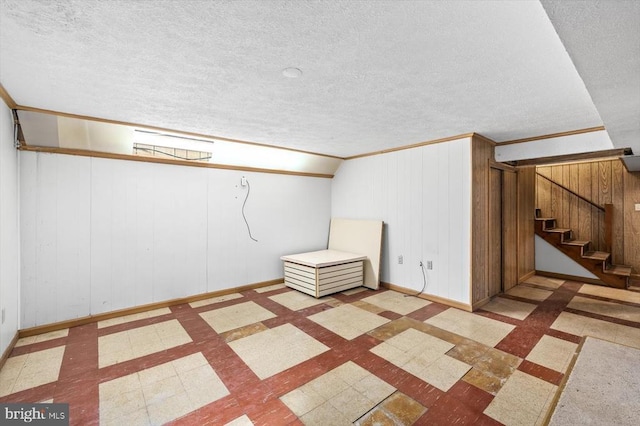 148 Red Hill Rd, Orange, VA 22960 - finished basement featuring baseboards, a textured ceiling, crown molding, stairway, and tile patterned floors