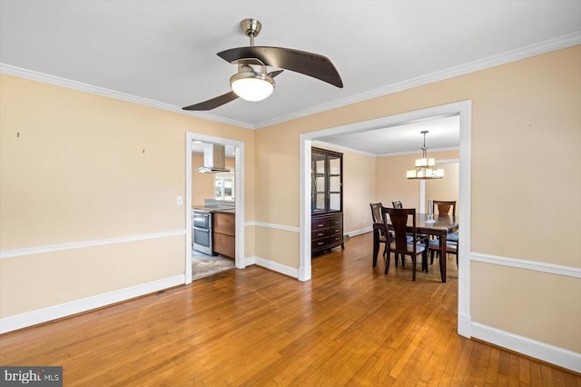 148 Red Hill Rd, Orange, VA 22960 - dining room with light wood-style flooring, baseboards, ornamental molding, a ceiling fan, and a chandelier