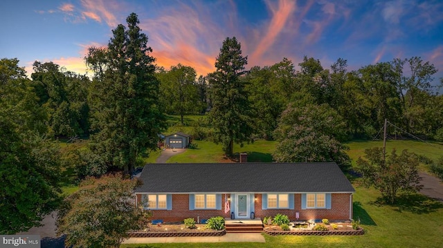 148 Red Hill Rd, Orange, VA 22960 - single story home with a front yard, an outbuilding, and brick siding