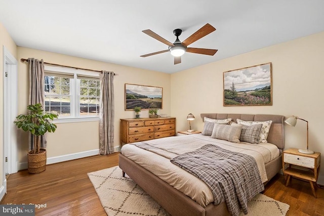 148 Red Hill Rd, Orange, VA 22960 - bedroom with baseboards, wood finished floors, and a ceiling fan