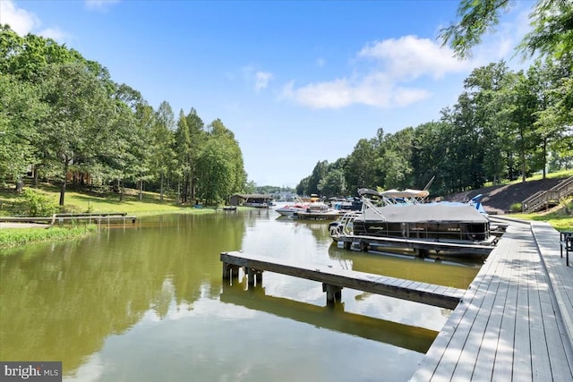 5509 Bazzanella Dr, Mineral, VA 23117 - dock featuring a water view, boat lift, and view of scattered trees