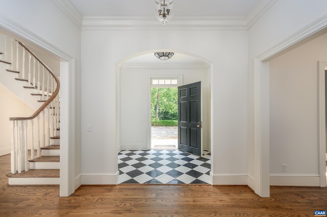 2621 Coopers Ln, Charlottesville, VA 22902 - entrance foyer with crown molding, baseboards, and arched walkways