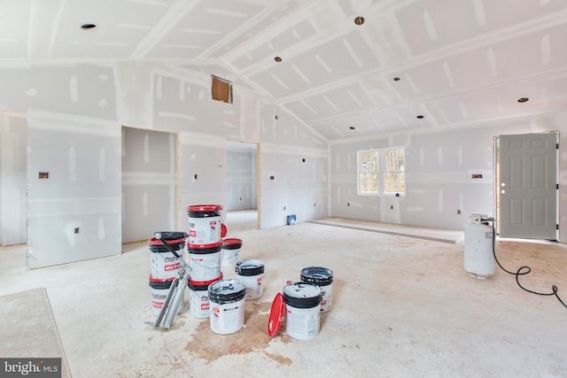 interior space featuring vaulted ceiling