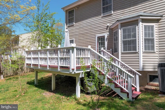 8802 Dundee Dr, Fredericksburg, VA 22408 - wooden deck featuring a lawn and central AC unit