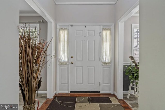 8802 Dundee Dr, Fredericksburg, VA 22408 - entryway featuring wood finished floors, crown molding, and baseboards