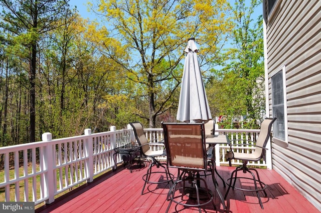 8802 Dundee Dr, Fredericksburg, VA 22408 - wooden terrace with outdoor dining space