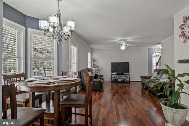 8802 Dundee Dr, Fredericksburg, VA 22408 - dining room featuring ornamental molding, wood finished floors, a chandelier, ceiling fan, and baseboards