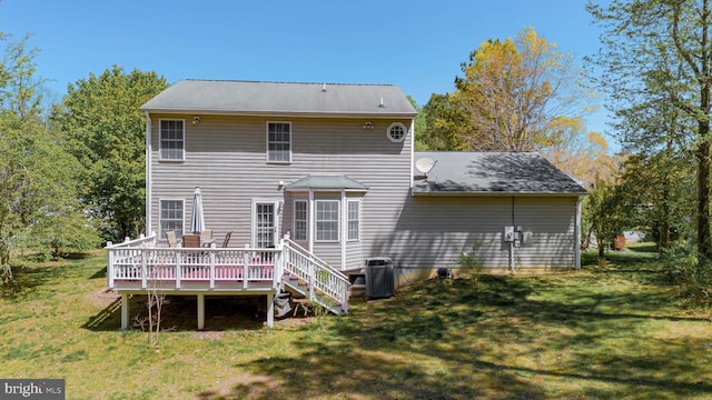 8802 Dundee Dr, Fredericksburg, VA 22408 - rear view of house with a deck and a lawn