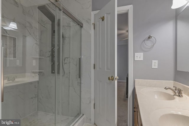 8802 Dundee Dr, Fredericksburg, VA 22408 - bathroom featuring a marble finish shower, double vanity, and ceiling fan