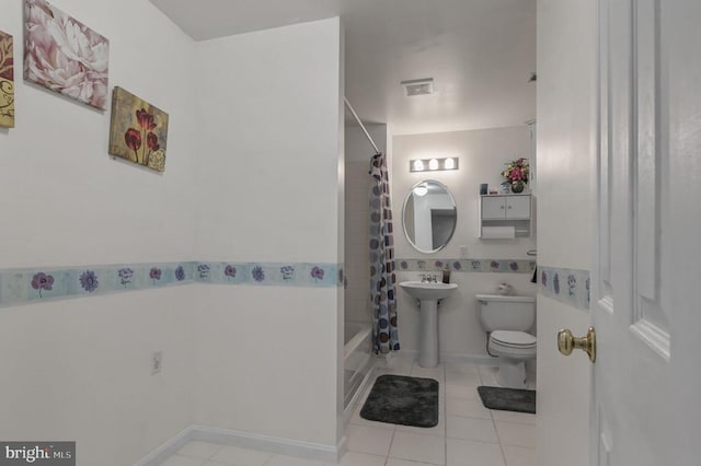 8802 Dundee Dr, Fredericksburg, VA 22408 - full bath with toilet, tile patterned floors, and shower / tub combo