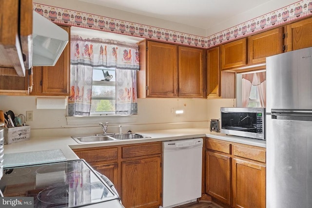 14026 Eggbornsville Rd, Culpeper, VA 22701 - kitchen featuring a sink, brown cabinets, light countertops, and appliances with stainless steel finishes