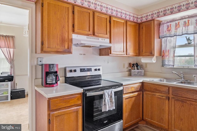 14026 Eggbornsville Rd, Culpeper, VA 22701 - kitchen featuring a sink, brown cabinets, under cabinet range hood, light countertops, and electric stove