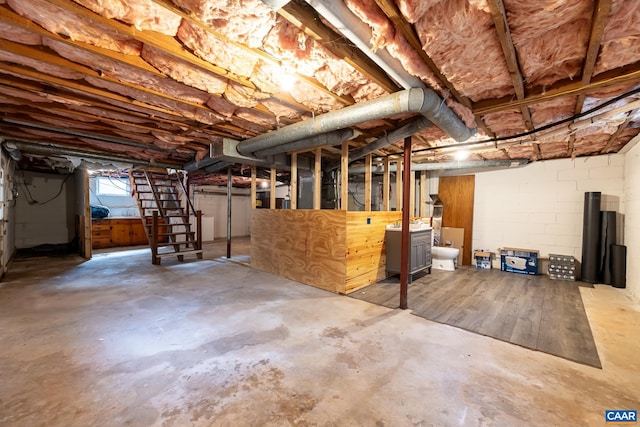 1211 River Vista Ave, Charlottesville, VA 22901 - basement with stairs and concrete block wall