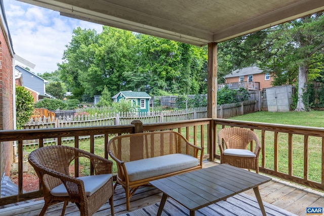 1211 River Vista Ave, Charlottesville, VA 22901 - wooden terrace featuring a storage shed, a fenced backyard, and view of wooded area