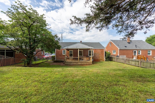 1211 River Vista Ave, Charlottesville, VA 22901 - back of property featuring a fenced backyard, a wooden deck, and brick siding