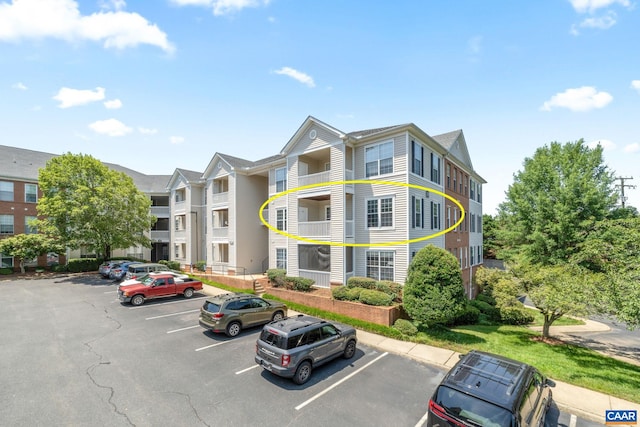260 Riverbend Dr Unit 3C, Charlottesville, VA 22911 - view of building exterior featuring uncovered parking