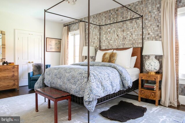  - bedroom with wood finished floors