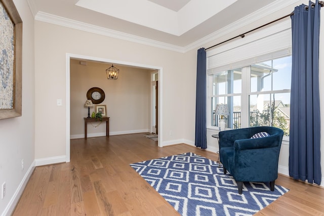 33 Silver Maple Cv, Fishersville, VA 22939 - living area featuring crown molding, wood finished floors, a chandelier, and baseboards