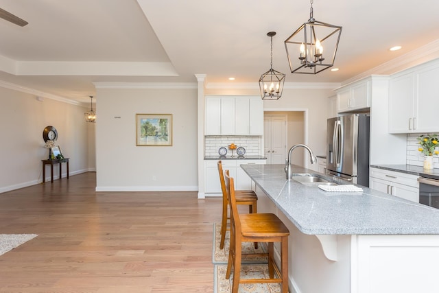 33 Silver Maple Cv, Fishersville, VA 22939 - kitchen featuring a sink, stainless steel fridge, a chandelier, tasteful backsplash, and recessed lighting