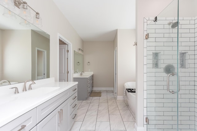 33 Silver Maple Cv, Fishersville, VA 22939 - bathroom with a stall shower, marble look tiles, two vanities, and baseboards