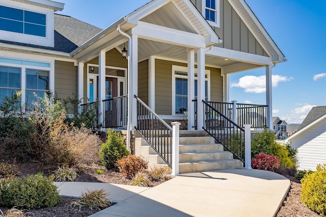 33 Silver Maple Cv, Fishersville, VA 22939 - entrance to property with board and batten siding, roof with shingles, and covered porch