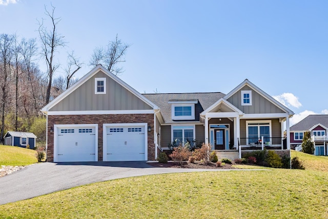 33 Silver Maple Cv, Fishersville, VA 22939 - craftsman inspired home with covered porch, board and batten siding, asphalt driveway, a front yard, and an attached garage