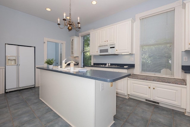 557 Wayne Ave S, Waynesboro, VA 22980 - kitchen featuring white appliances, dark countertops, white cabinets, a chandelier, and recessed lighting