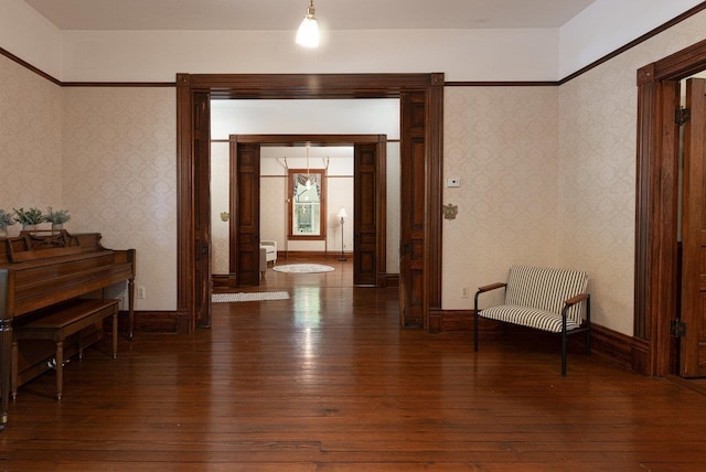557 Wayne Ave S, Waynesboro, VA 22980 - corridor featuring wood-type flooring, wallpapered walls, and baseboards